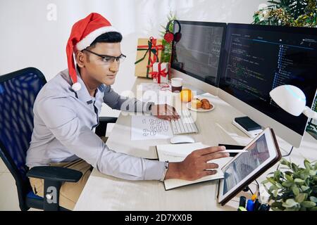 Programmer checking block diagram Stock Photo