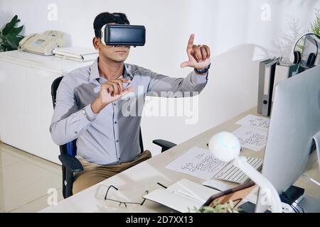 Programmer testing virtual interface Stock Photo