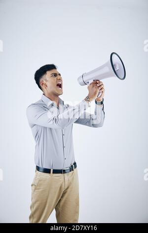 Screaming young businessman Stock Photo