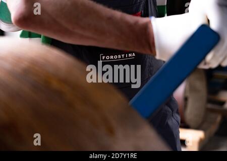 Worker at factory measures works metal production industrial Stock Photo