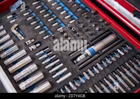 Professional auto repair kit with sockets and screwdriver bits Stock Photo