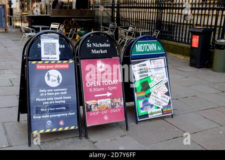 Shopfronts in Bristol city Centre. A boards showing the entrance to St Nicholas markets during the 2020 covid-19 pandemic. Stock Photo