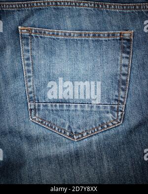 Back pocket on old worn jeans Stock Photo