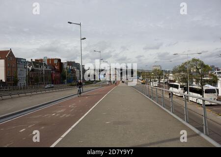 AMSTERDAM NETHERLANDS, SEPTEMBER 17, 2017: Man cycle in bicycle lane, Netherlands Stock Photo