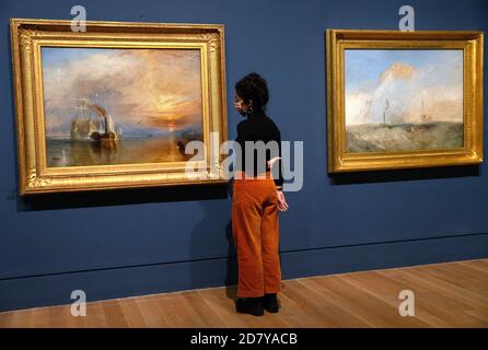 London, UK. 26th Oct, 2020. 'The Fighting Temeraire', 1839(left) is re-united with its preparatory sketch for the first time. Landmark exhibition of J.M.W.Turner(1775-1851) with key paintings loaned from The National Gallery opening on October 28th. Credit: Mark Thomas/Alamy Live News Stock Photo