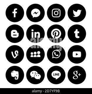Kiev, Ukraine - August 25, 2020: Collection of popular small black round social media icons, printed on paper: Facebook, Twitter, Google Plus, Instagr Stock Photo
