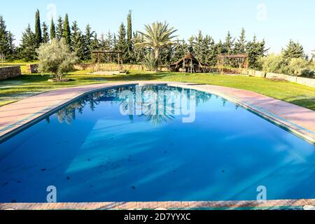swimming pool in the garden, photo as background Stock Photo