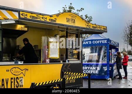Fish and Take away. On Dun Laoghaire Pier in Dublin Ireland, a fish and chip take away and a queue for coffee. Stock Photo
