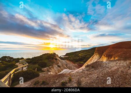 Hallett Cove boardwalk around Sugarloaf at sunset, South Australia Stock Photo