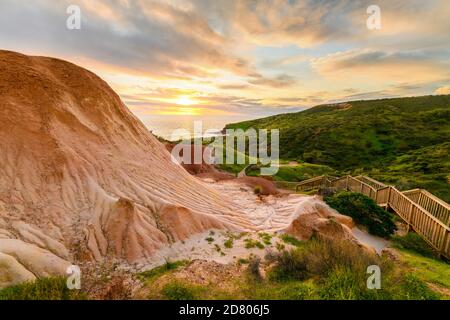 Hallett Cove boardwalk around Sugarloaf at sunset, South Australia Stock Photo