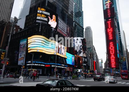 A billboard by The Lincoln Project depicts Ivanka Trump presenting the number of New Yorkers and Americans who have died due to COVID-19 and Jared Kus Stock Photo