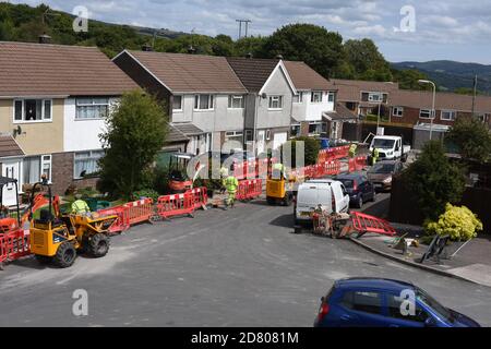 Trench digging in existing pavements to be ready to instal Virgin high speed fibreoptic cables to houses number 3949. Stock Photo