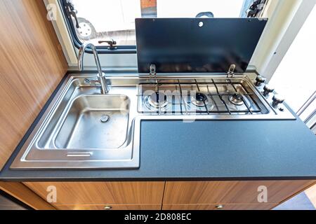 Compact Kitchen Counter in Modern Camper Van Stock Photo