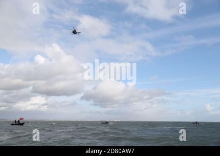 RETRANSMITTING Amending distance achieved on jump to 40m. Former paratrooper John Bream attempts a record for highest jump without a parachute by jumping 40m from a helicopter into the sea off Hayling Island in Hampshire. Stock Photo
