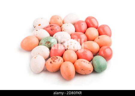 Pile of chocolate eggs candies isolated on white background. close up, side view, macro. Stock Photo