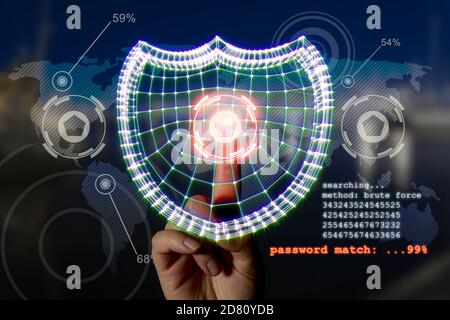 Computer security concept. Hand and shield symbolizing data protection in the network and personal computers. Mixed media. Stock Photo