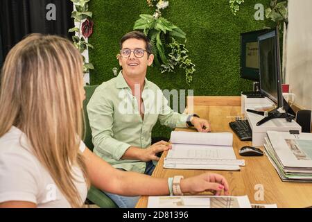 colleagues talk in the break Stock Photo
