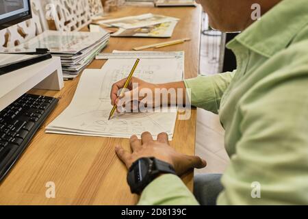 designer is drawing his projects Stock Photo