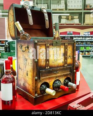 Decorative open the chest for storing wine bottles in the store' Stock Photo