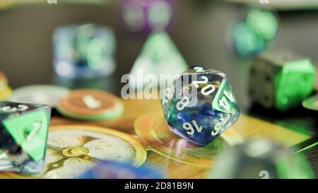A d20 dice during the tabletop game Stock Photo