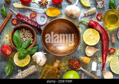 Various herbs and spices on black background - top view Stock Photo