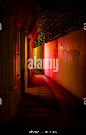 Neon Pink Glow from a Shop WIndow in George Street, Hastings Old Town Stock Photo