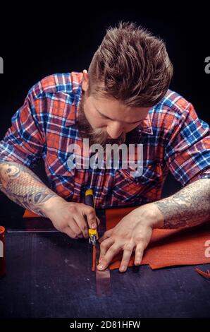 Artisan being keen on his buisness Stock Photo