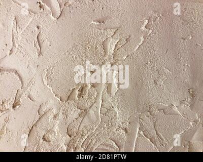 Textured plaster. Beige wall stucco texture. Plastered background Stock Photo