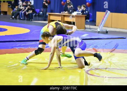 Orenburg, Russia - October 25-26, 2017: Girls compete in sports wrestling at the All-Russian tournament for the prizes of the Governor of Orenburg Reg Stock Photo