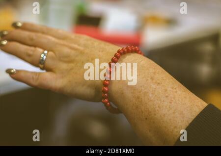 bracelet from red beads gem stones Stock Photo