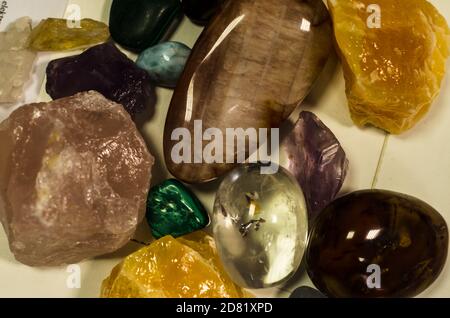 mixture of transparent, brown, pink and yellow gem stones Stock Photo