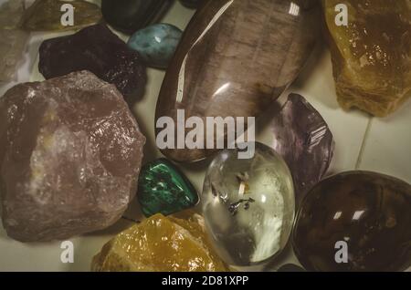 mixture of transparent, brown, pink and yellow gem stones Stock Photo