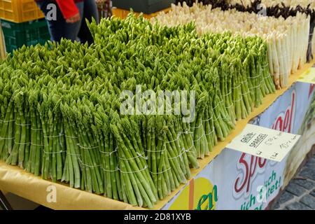 Green & White asparagus on a German market stall. Stock Photo