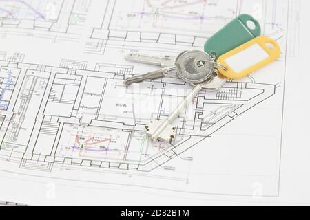 design modeling of housing a set of keys to the house on the architectural project of the house. Stock Photo