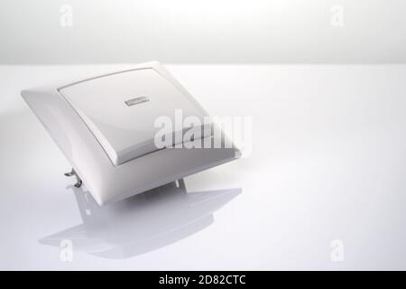 The design of square light switch on the glossy table. Stock Photo
