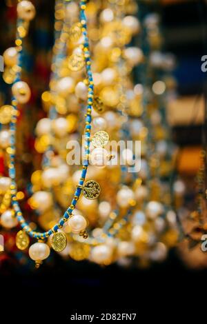 Various colorful beads in the market. Necklace of colorful beads Stock Photo