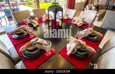 Dining Table With Eight Place Settings & Chairs Stock Photo