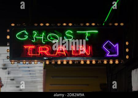 Ghost train neon sign on Walton-on-the-Naze pier, Essex, UK Stock Photo