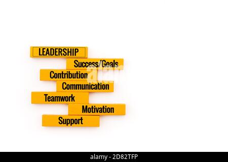 Leadership business concept. yellow wooden block stacking on white background Stock Photo