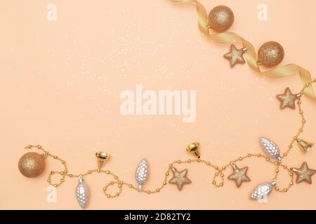 golden star, bell and ball on golden background for birthday, christmas or wedding ceremony Stock Photo