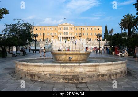 Athens, Greece - July 06, 2009: people crowd the Syntagma square and on the background the greek parliament in Athens, Greece Stock Photo