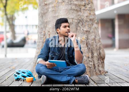 Young man outside in the city Stock Photo