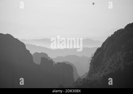 Hot air balloon in the mountains Stock Photo