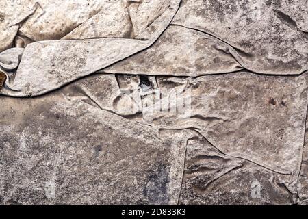 Milano -10/101/2020: wrinkled sheet of crushed tin aluminum silver foil background Stock Photo