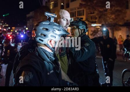 Bellevue, USA. 24th Oct, 2020. Early in the evening a man yelling at a woman in a BLM protest downtown. Stock Photo