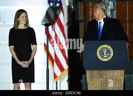 Washington, United States. 26th Oct, 2020. President Donald Trump introduces Judge Amy Coney Barrett before she takes her Constitutional oath to become a Supreme Court justice, at the White House in Washington, DC on Monday, October 26, 2020. Earlier today Barrett was confirmed by the Senate, 52-48, replacing the late Ruth Bader Ginsburg. Photo by Kevin Dietsch/UPI. Credit: UPI/Alamy Live News Stock Photo