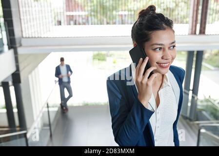 Business lady talking on phone Stock Photo