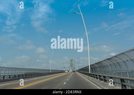 road traffic on the bridge of the americas entrance to the panama canal in the west of panama city Stock Photo