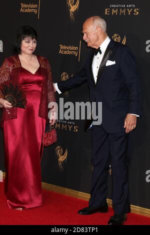 LOS ANGELES - SEP 10:  Gerald McRaney, Delta Burke at the 2017 Creative Arts Emmy Awards - Arrivals at the Microsoft Theater on September 10, 2017 in Los Angeles, CA Stock Photo