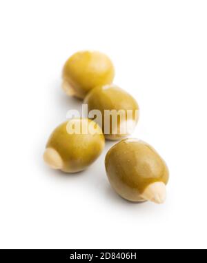 Pitted green olives stuffed with almonds isolated on white background. Stock Photo
